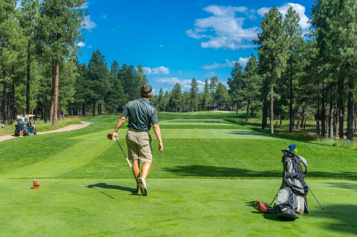 Man playing golf